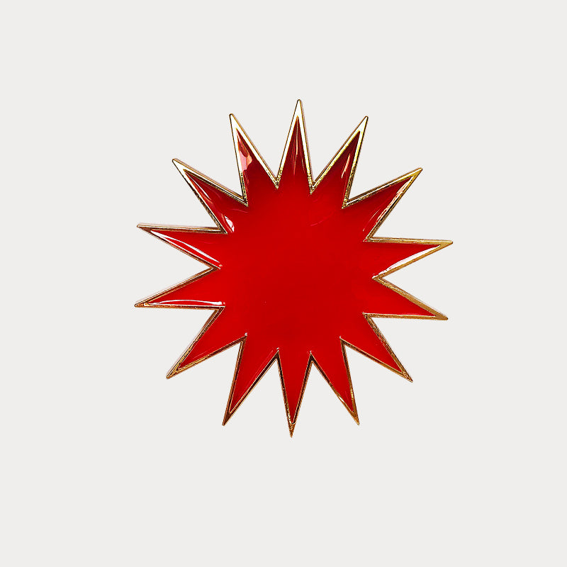 Bijou clip en forme d'étoile rouge